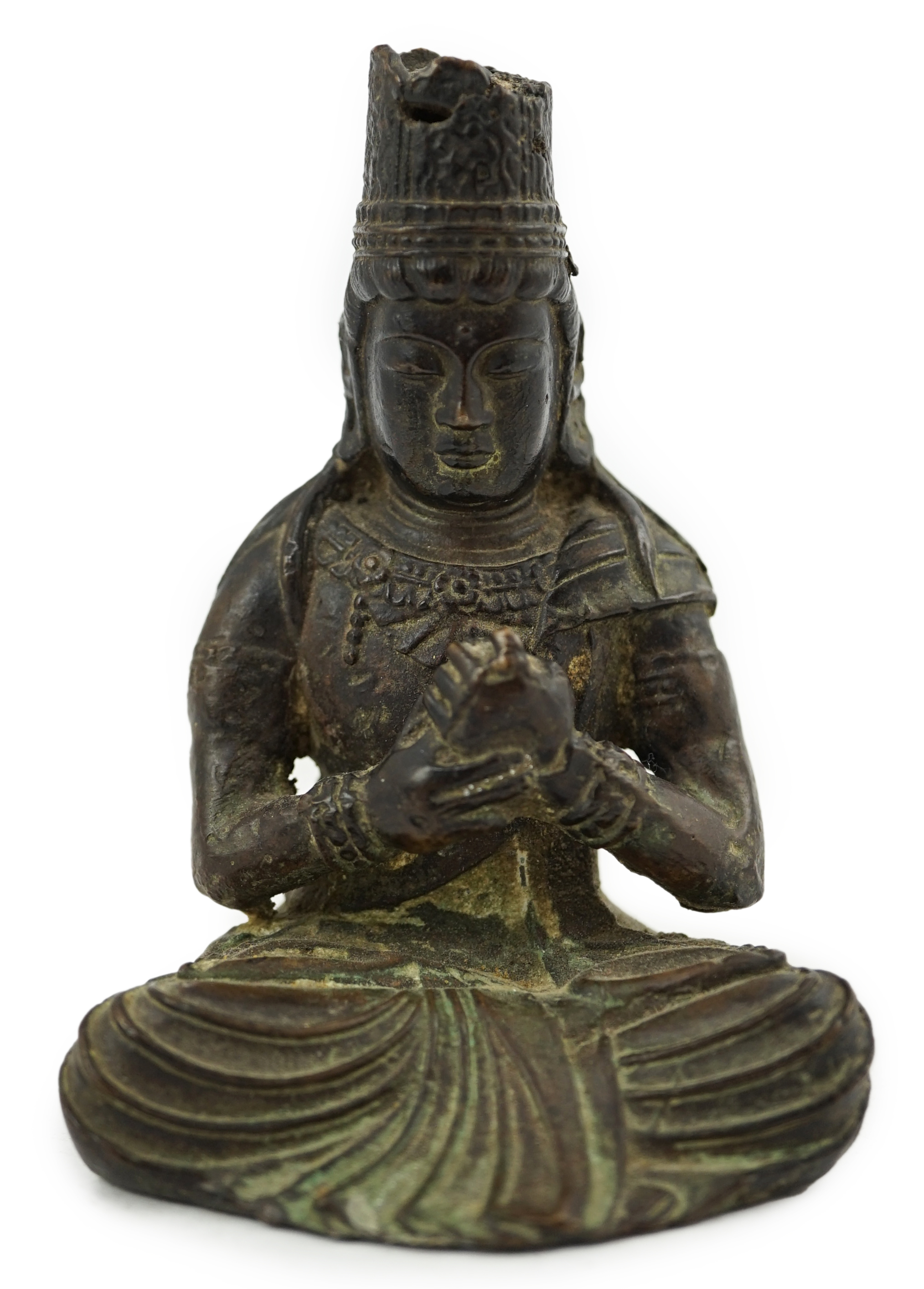 A small South East Asian bronze seated figure of Vairocana Buddha, probably 17th/18th century